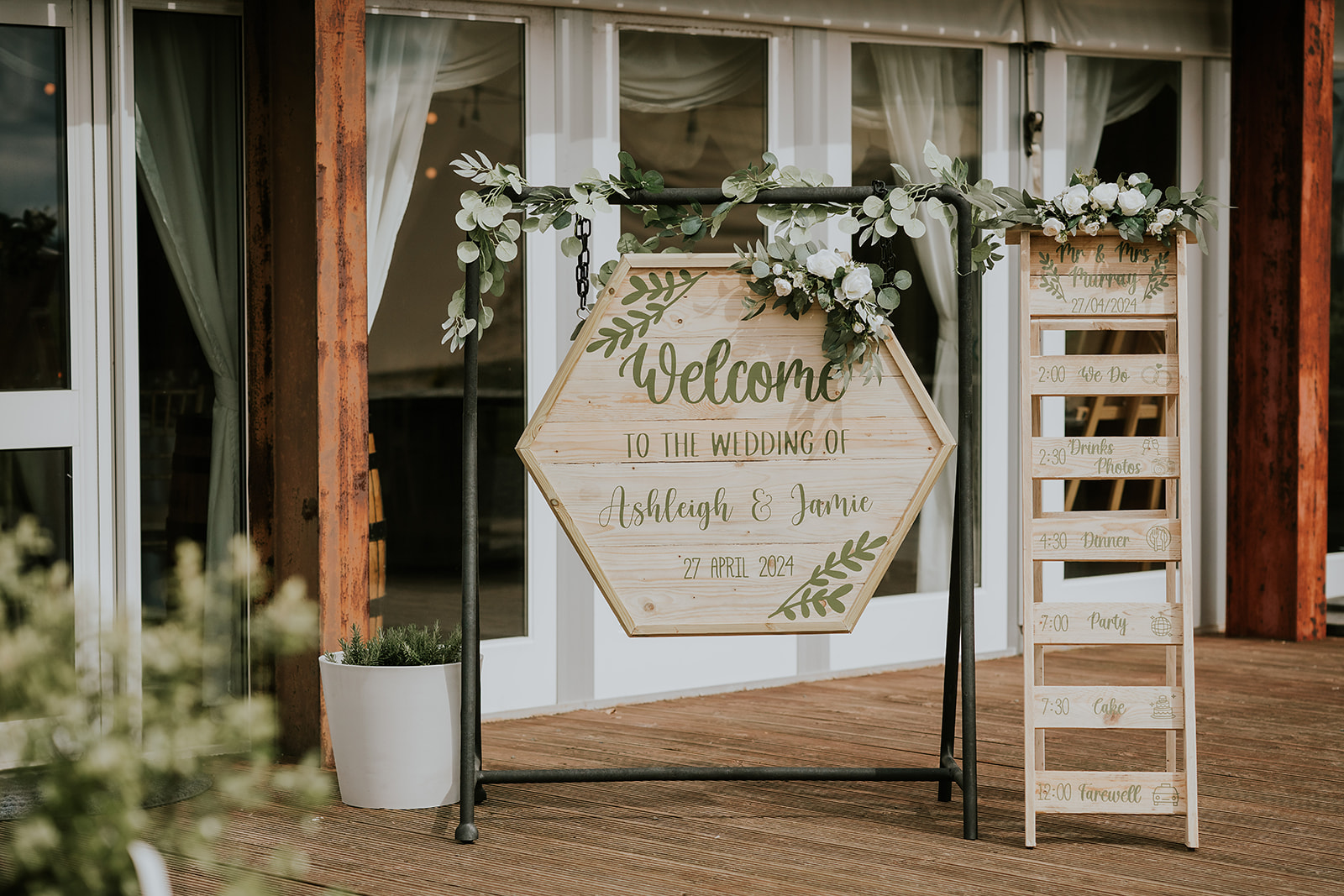 Ashleigh and Jamie wedding ceremony at Vallum Weddings with family decorations